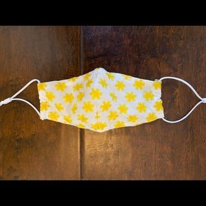 Lele Sadoughi mask with adjustable ear straps